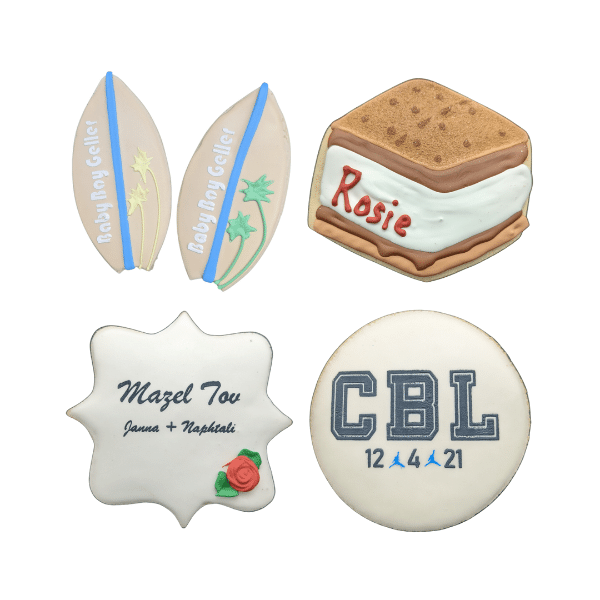 4 different kinds of custom kosher sugar cookies. A surfboard with someones name, a smore's cookie with Rosie, a Mazel Tov cookie and one for a sports team